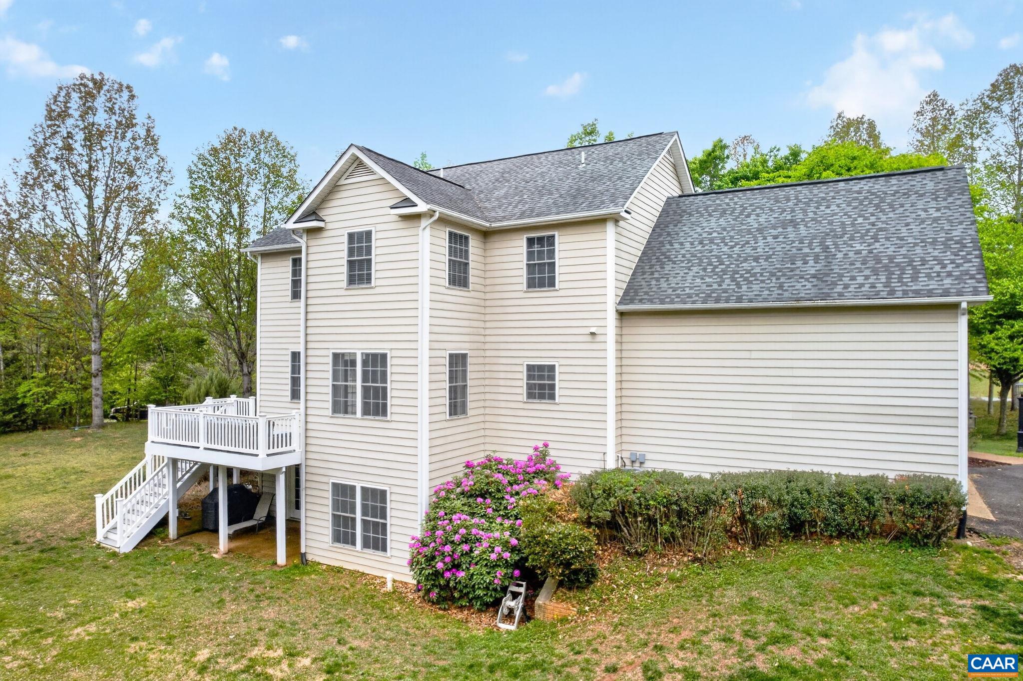 511 Taylor Ridge Way Palmyra, VA 22963 - Photo 50 of 57 a view of a house with a yard and sitting area