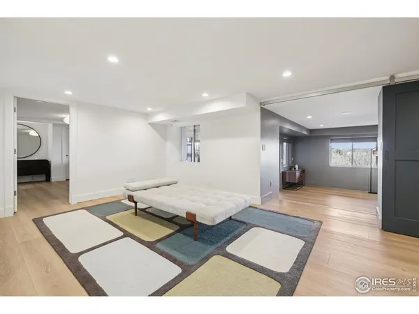a living room with furniture and a table