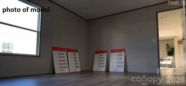a view of an empty room and window