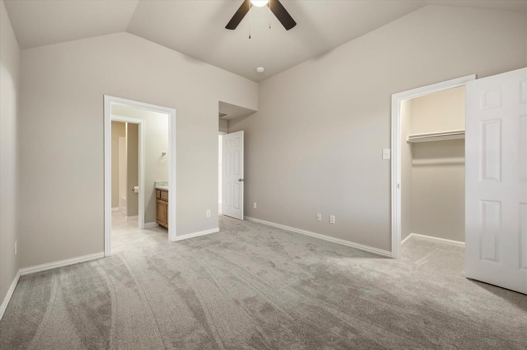 118 Stone Drive Forney, TX 75126 - Photo 19 of 26 an empty room with chandelier fan