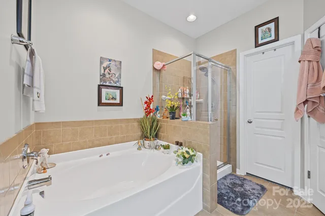 a bathroom with a sink vanity and mirror