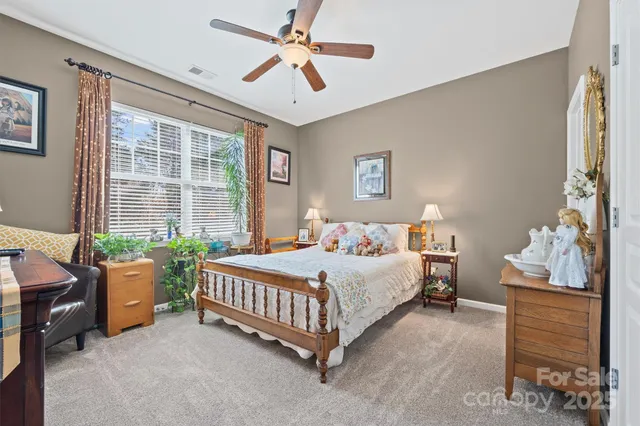 a bathroom with a sink a mirror and a shower