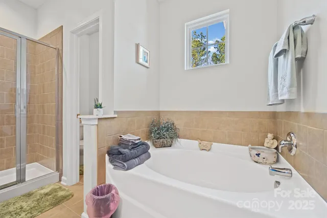 a view of a swimming pool with outdoor seating