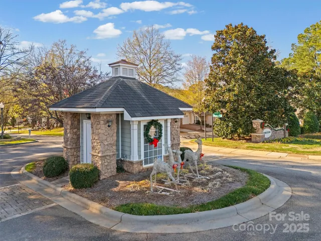 an aerial view of a house with outdoor space