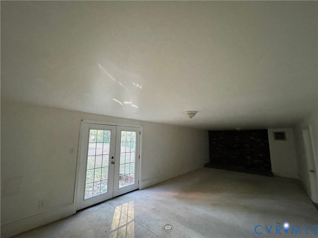 2118 Dolin Street Hopewell, VA 23860 - Photo 15 of 17 Carpeted spare room with french doors