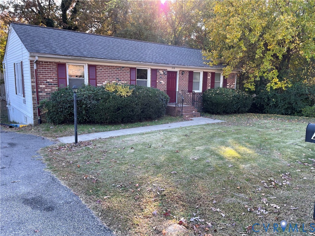 2118 Dolin Street Hopewell, VA 23860 - Photo 16 of 17 Ranch-style home with brick siding, roof with shin