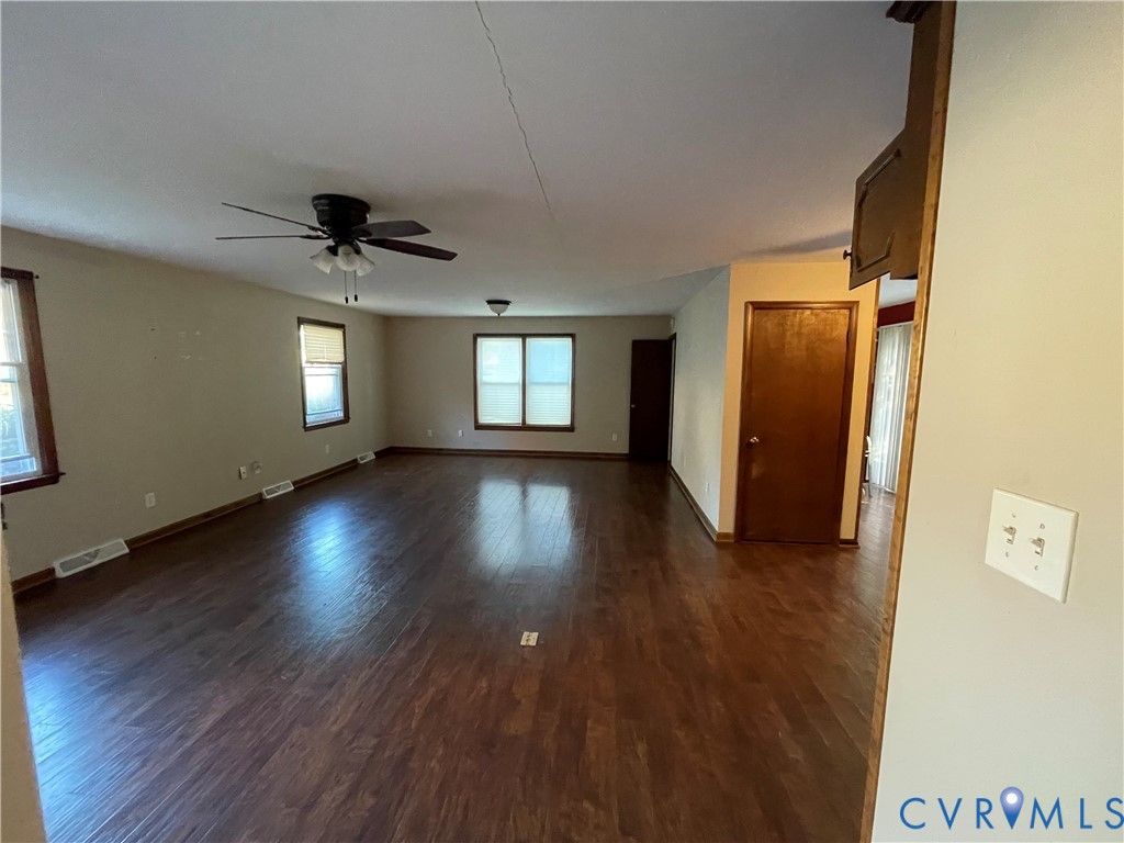 2118 Dolin Street Hopewell, VA 23860 - Photo 5 of 17 Empty room featuring dark wood-style floors and ce