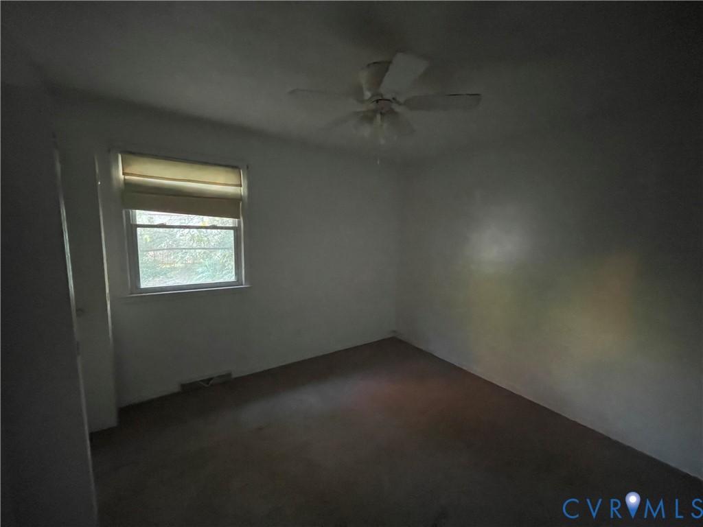 2118 Dolin Street Hopewell, VA 23860 - Photo 7 of 17 Empty room featuring ceiling fan