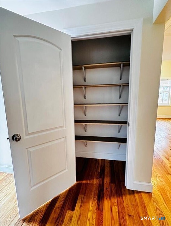 31 Brainerd Road, Unit 2 Branford, CT 06405 - Photo 14 of 15 a view of walk in closet with empty racks