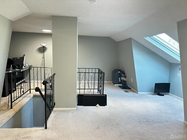 a view of a livingroom with a staircase