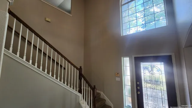 a view of an entryway with staircase