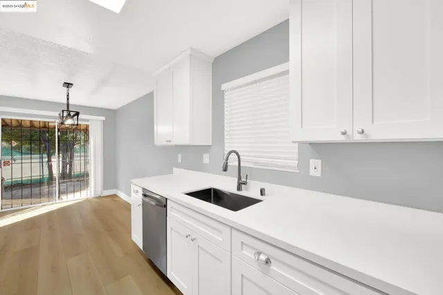 a kitchen with a stove and a microwave