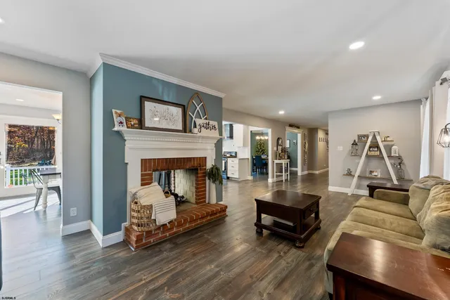 a kitchen with wooden cabinets and center island
