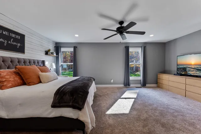 a backyard of a house with seating space