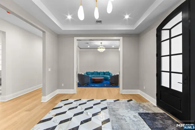 a view of a bedroom from a hallway