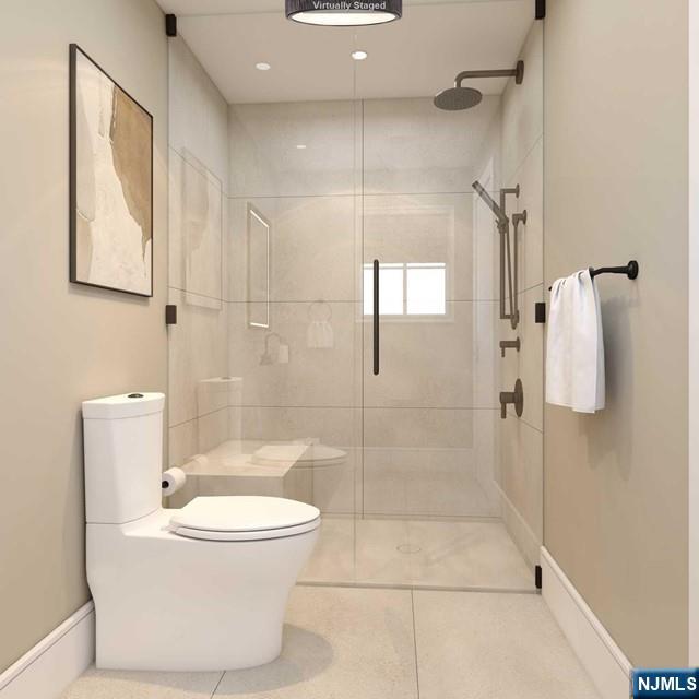645 Summit Street Englewood Cliffs, NJ 07632 - Photo 17 of 33 a bathroom with a toilet and a shower