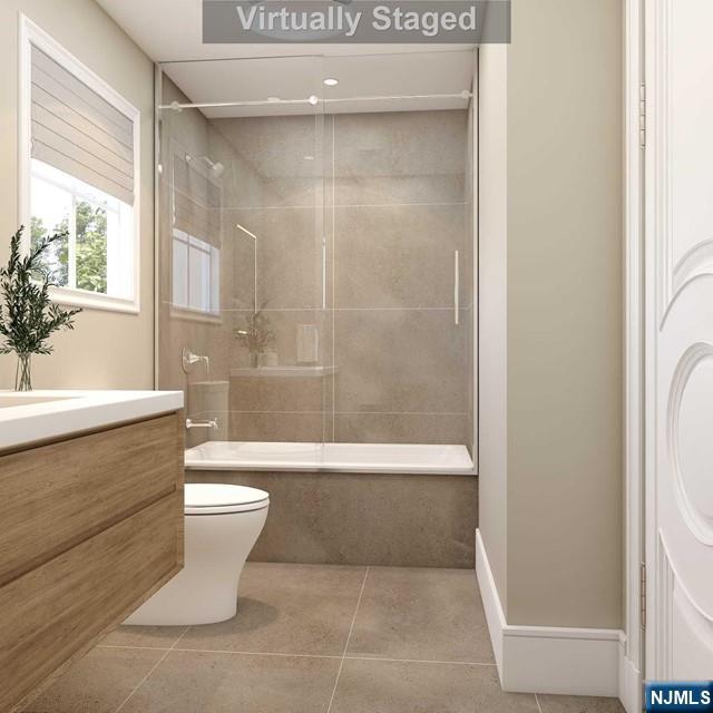 645 Summit Street Englewood Cliffs, NJ 07632 - Photo 23 of 33 a bathroom with a bathtub toilet and sink