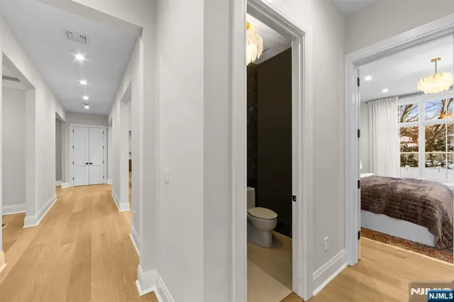 a living room with stainless steel appliances kitchen island granite countertop furniture and a kitchen view