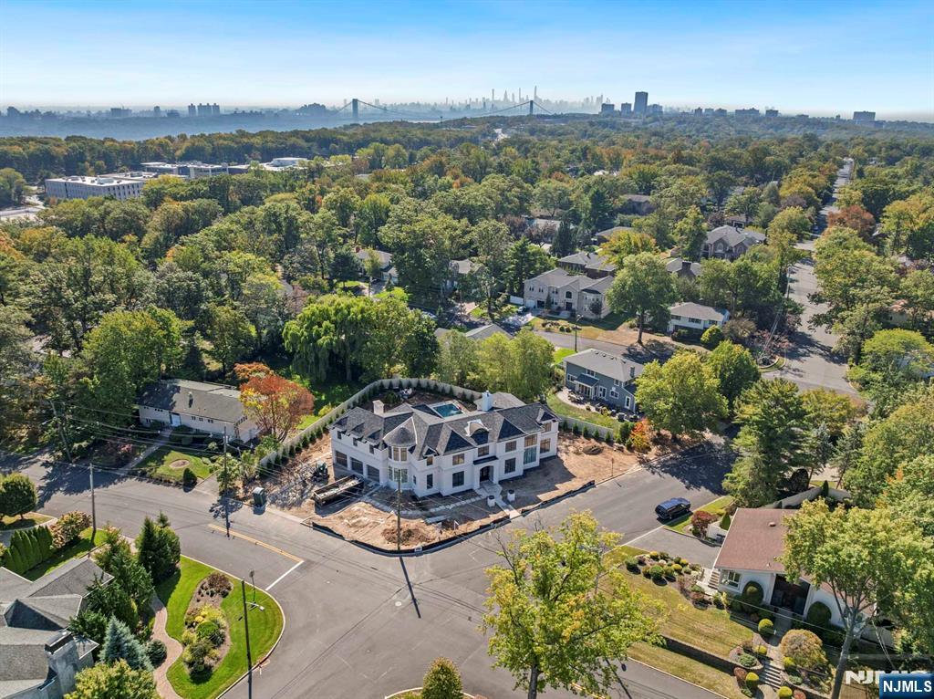 645 Summit Street Englewood Cliffs, NJ 07632 - Photo 28 of 33 an aerial view of a house with a yard and lake view
