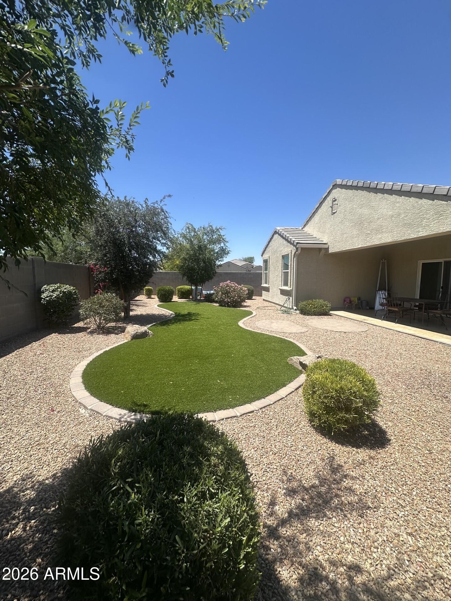7851 West Riverside Avenue Phoenix, AZ 85043 - Photo 39 of 40 a view of a swimming pool with a yard