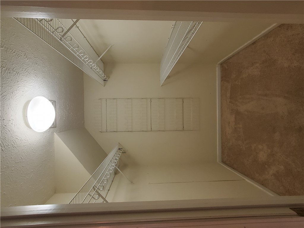 123 Perkins Place Seneca, SC 29678 - Photo 12 of 20 This spacious walk-in closet offers ample storage potential for your wardrobe.