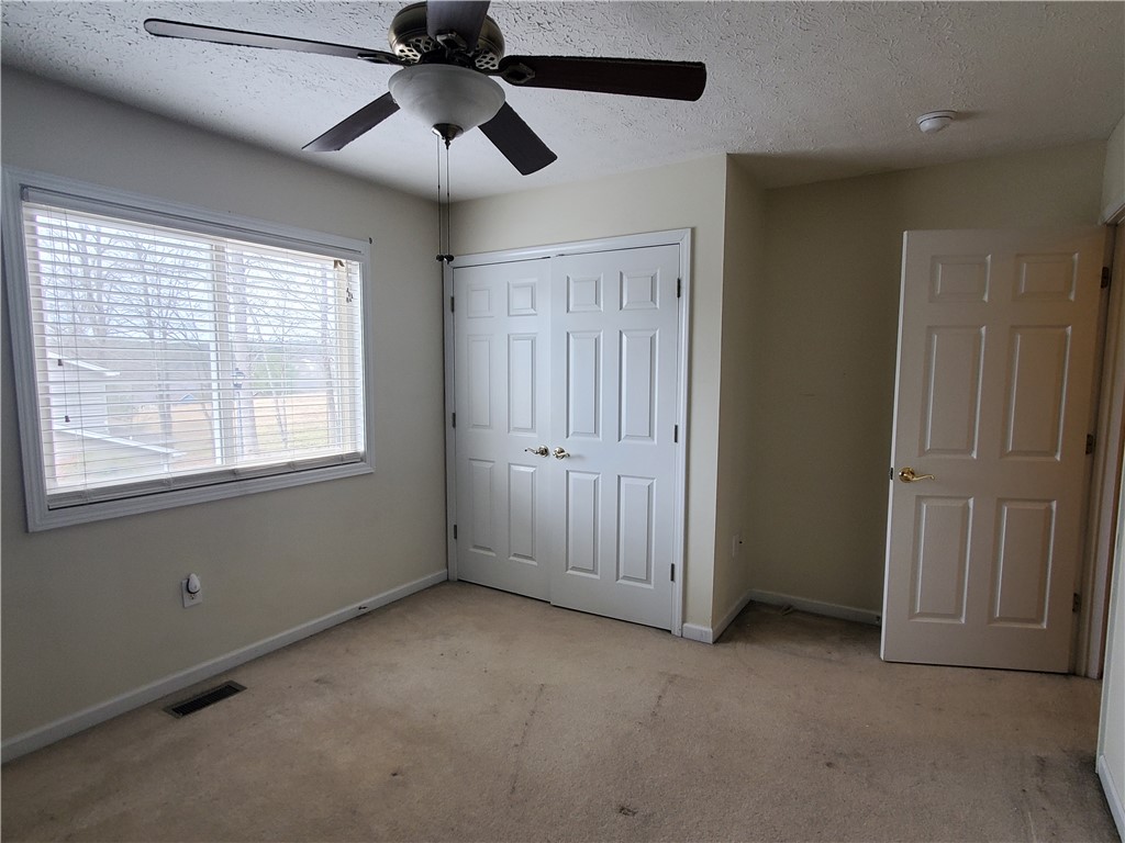 123 Perkins Place Seneca, SC 29678 - Photo 16 of 20 This spacious bedroom offers ample natural light and a comfortable atmosphere for relaxation.