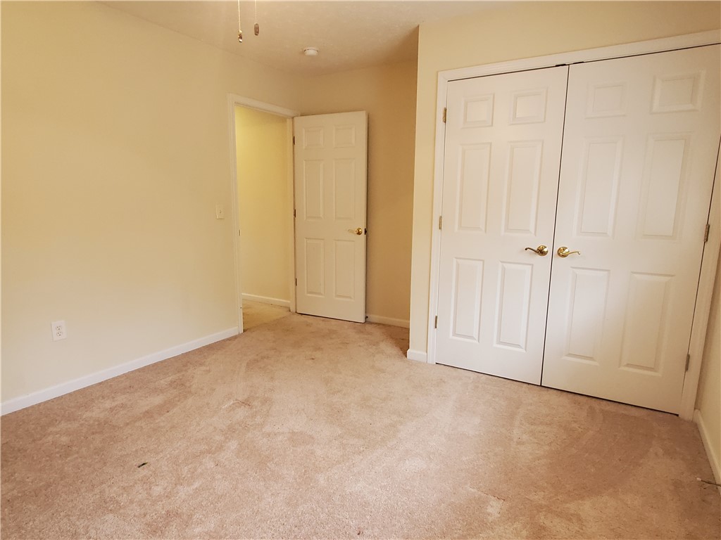 123 Perkins Place Seneca, SC 29678 - Photo 18 of 20 This spacious bedroom offers ample natural light and a neutral palette, awaiting your personal touch.