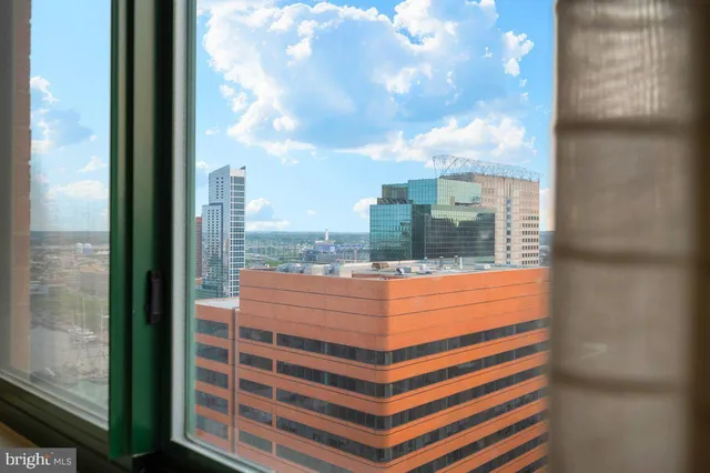 a view of a balcony with city view
