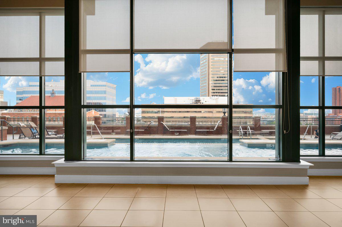 414 Water Street, Unit 2805 Baltimore, MD 21202 - Photo 25 of 26 a view of living room with a large window