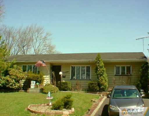 19 Princeton Road Old Bridge, NJ 08859 - Photo 1 of 2 front view of a house with a yard