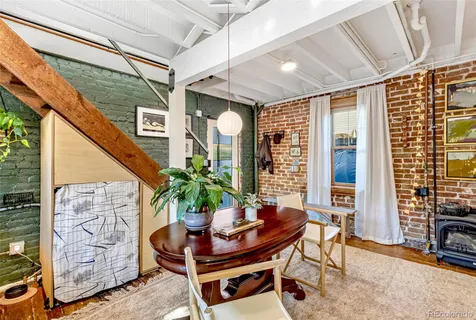 a kitchen with stainless steel appliances a sink and a stove