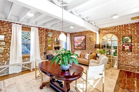 a kitchen with a stove oven and sink
