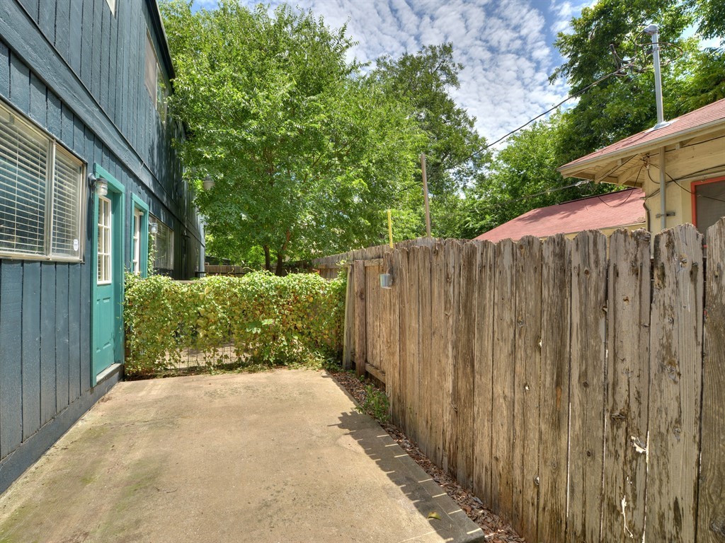 604 Franklin Boulevard, Unit A Austin, TX 78751 - Photo 20 of 20 a view of a pathway with a wooden fence