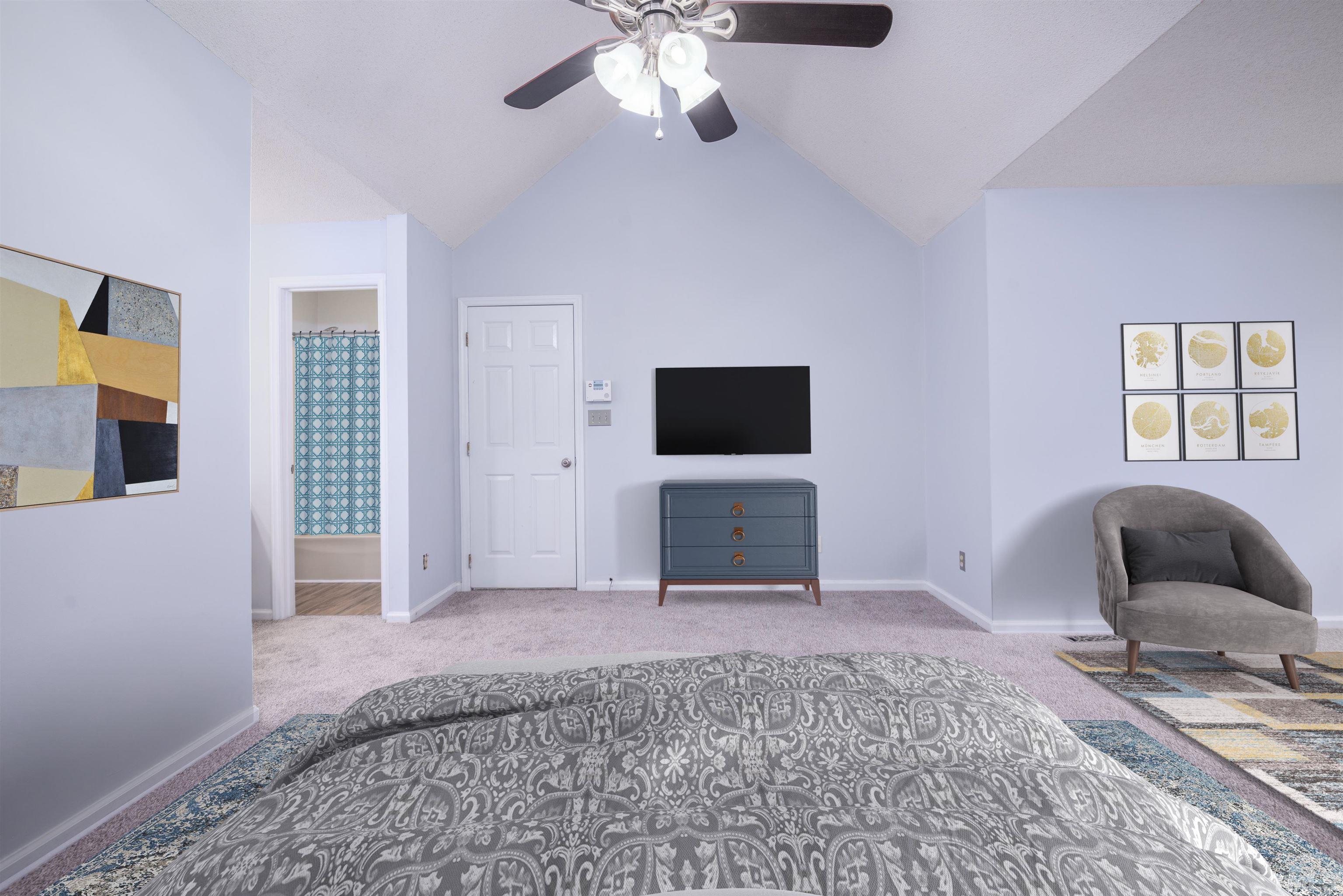 405 Oak Run Drive Raleigh, NC 27606 - Photo 28 of 83 a bedroom with furniture and a flat screen tv