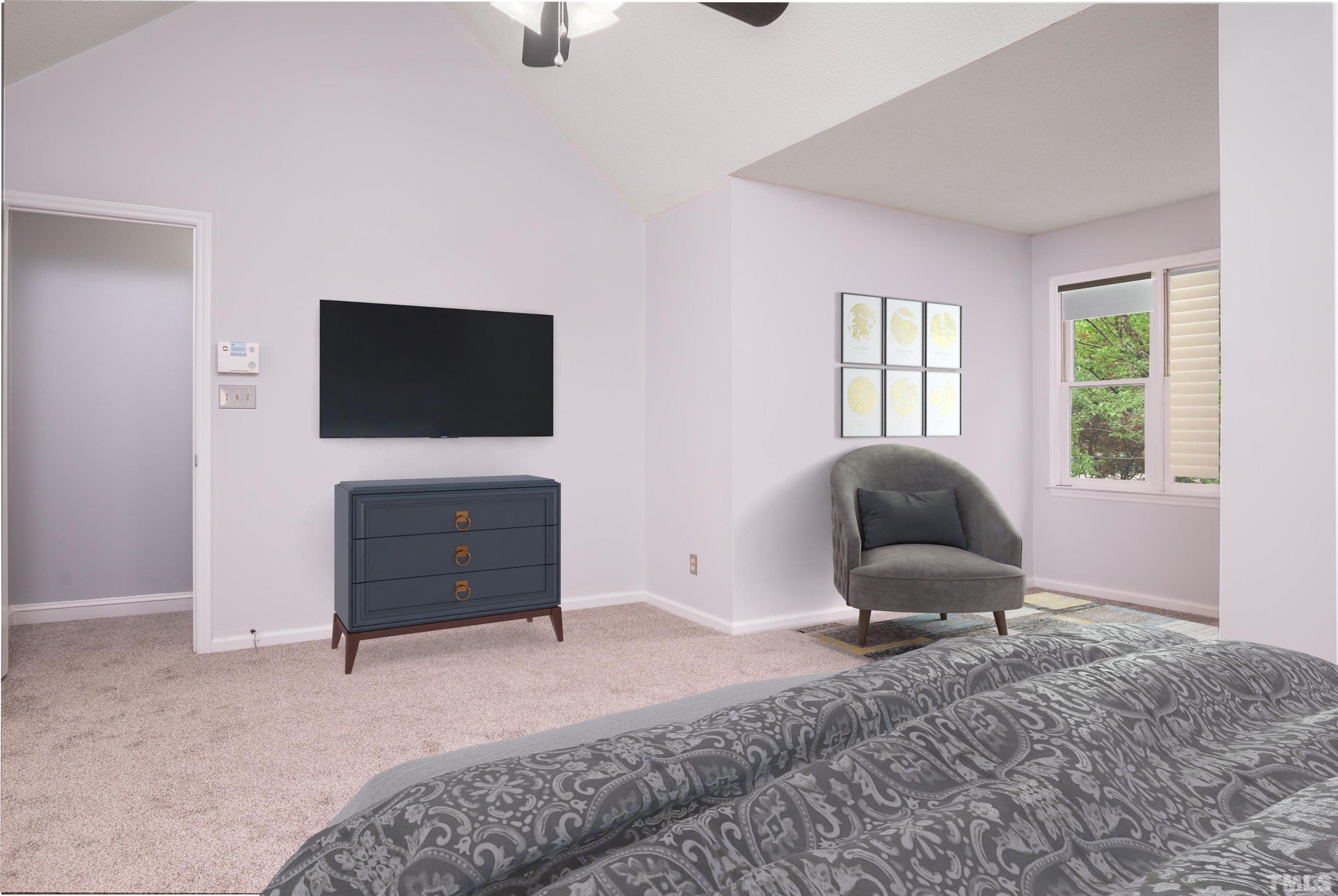 405 Oak Run Drive Raleigh, NC 27606 - Photo 30 of 83 a bedroom with a bed and flat screen tv