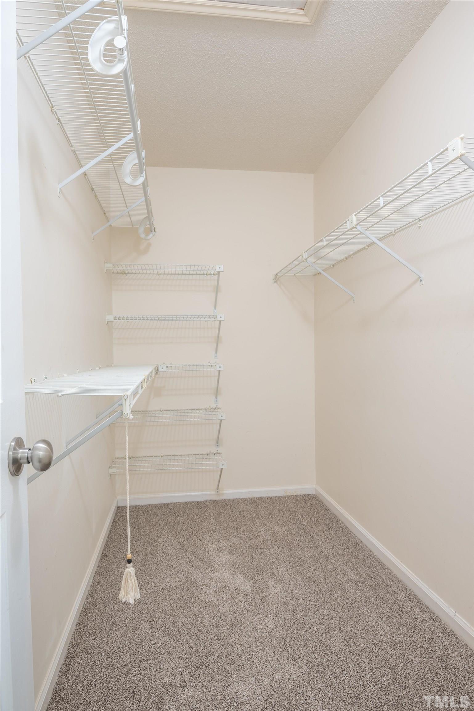405 Oak Run Drive Raleigh, NC 27606 - Photo 40 of 83 a view of an empty walk in closet
