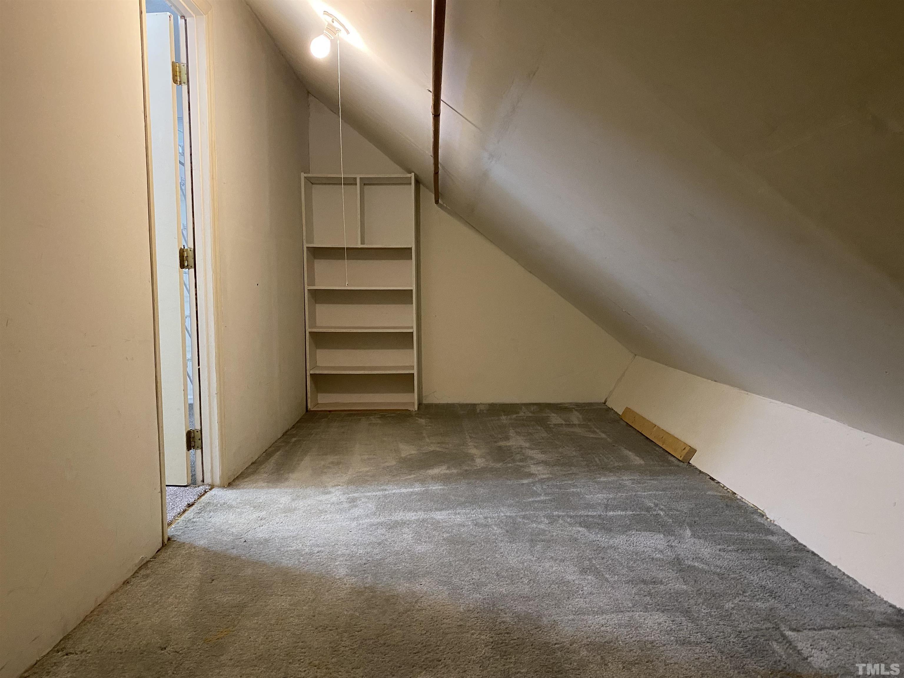 405 Oak Run Drive Raleigh, NC 27606 - Photo 81 of 83 a view of a room with stairs and white walls