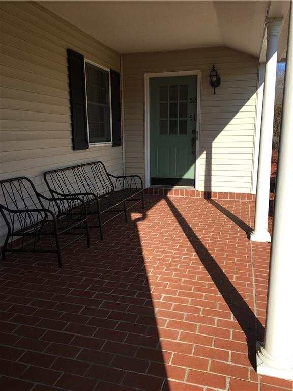 182 Windsor Ridge, Unit 52 New Castle, PA 16105 - Photo 23 of 25 Covered patio/entry from garage to entry of house.