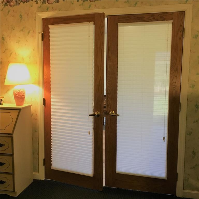182 Windsor Ridge, Unit 52 New Castle, PA 16105 - Photo 10 of 25 French doors=Master Bedroom