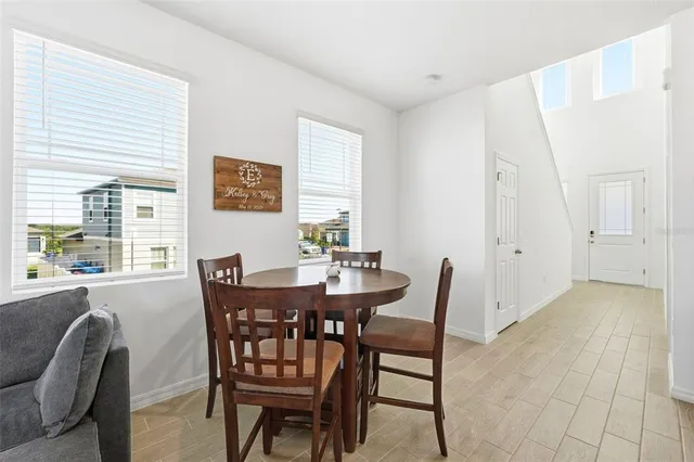a view of a dining room with furniture