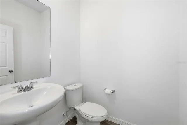 a bathroom with a sink and a toilet