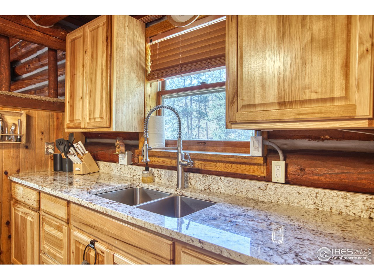 1761 Redbluff Road Livermore, CO 80536 - Photo 17 of 40 Kitchen with new countertops and beautiful cabinetry