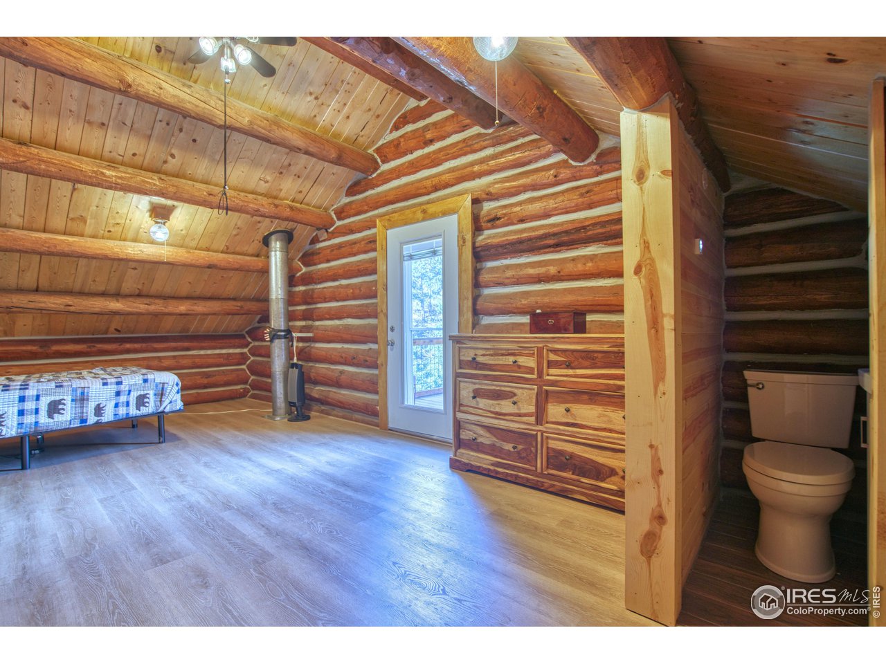 1761 Redbluff Road Livermore, CO 80536 - Photo 25 of 40 Another shot with 1/2 bath and door to private deck 8x12