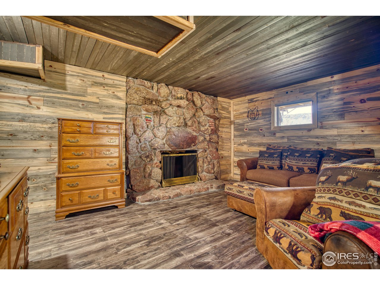 1761 Redbluff Road Livermore, CO 80536 - Photo 29 of 40 Lower level 2nd family room