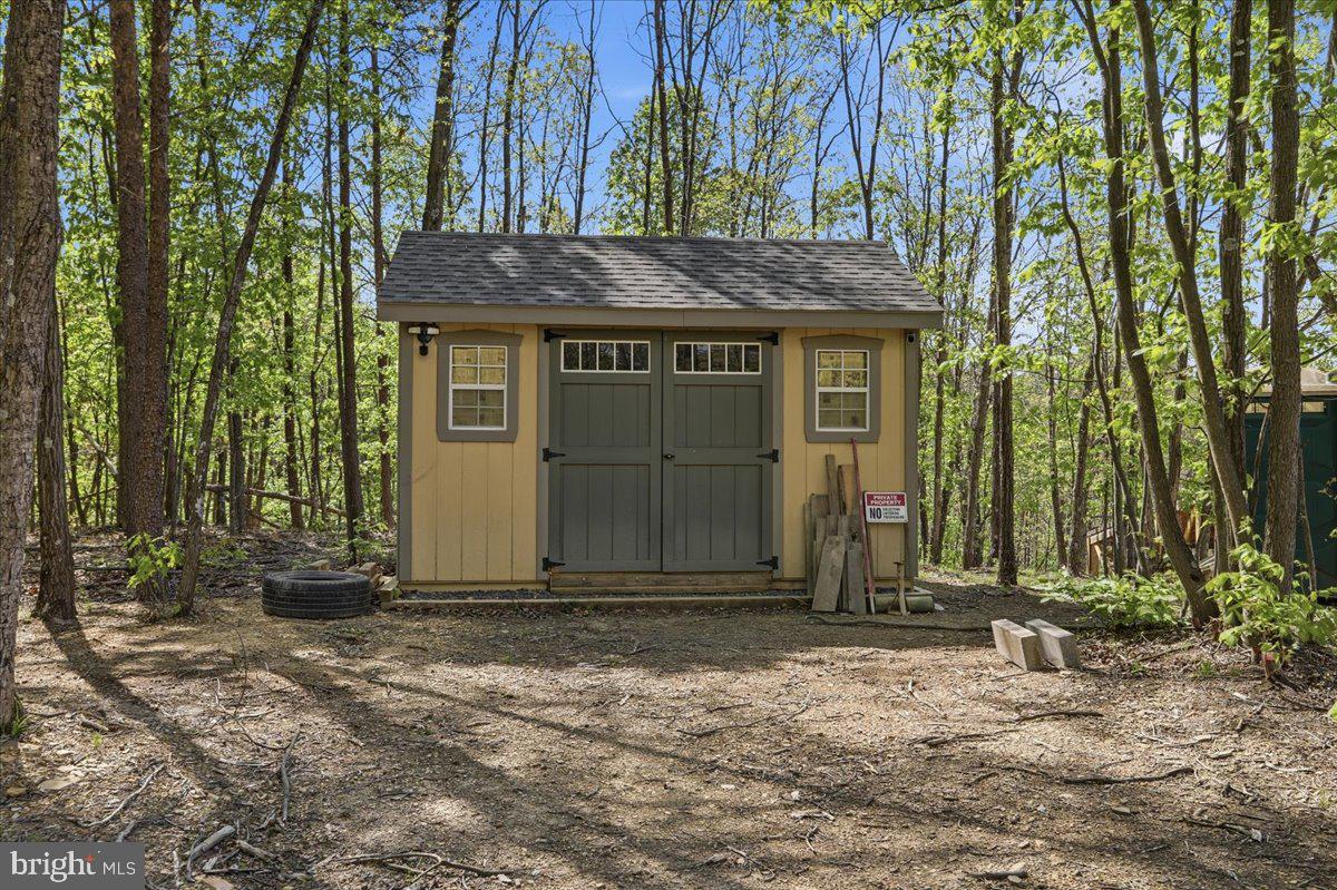 399 Buttonwood Trail Romney, WV 26757 - Photo 13 of 29 a house view with a outdoor space