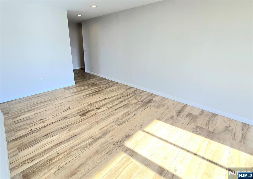 151 Prospect Avenue, Unit 19A Hackensack, NJ 07601 - Photo 6 of 17 a view of an empty room