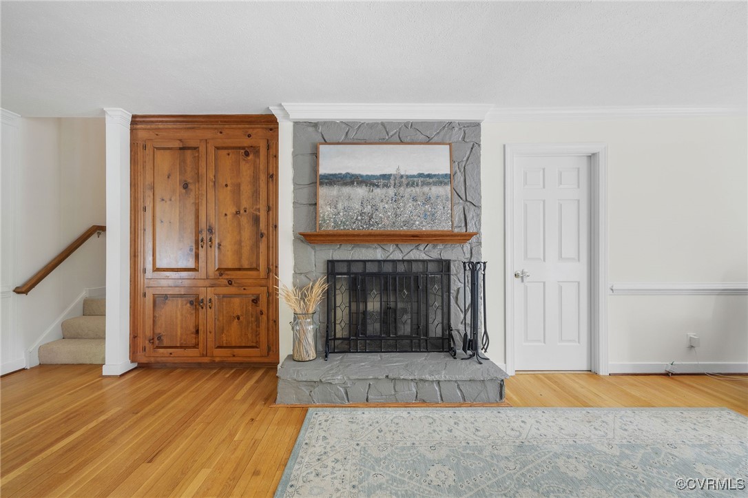 3001 Winterfield Road Midlothian, VA 23113 - Photo 11 of 50 a view of an empty room with wooden floor fireplace and a window