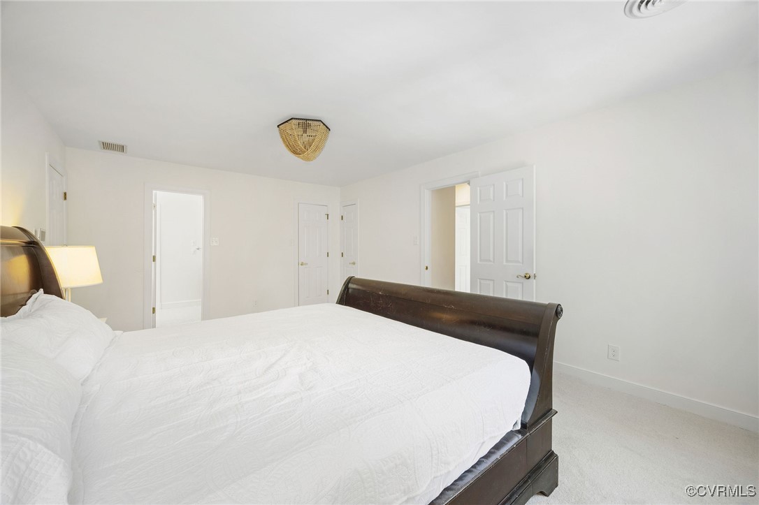 3001 Winterfield Road Midlothian, VA 23113 - Photo 24 of 50 a bedroom with a bed and a window