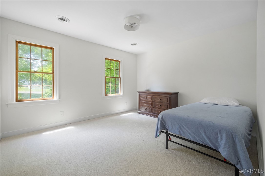 3001 Winterfield Road Midlothian, VA 23113 - Photo 32 of 50 a bedroom with a bed and a window