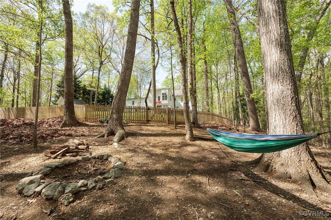 3001 Winterfield Road Midlothian, VA 23113 - Photo 47 of 50 a front view of a house with a yard